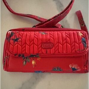 Lug wallet with crossbody strap. Brand new